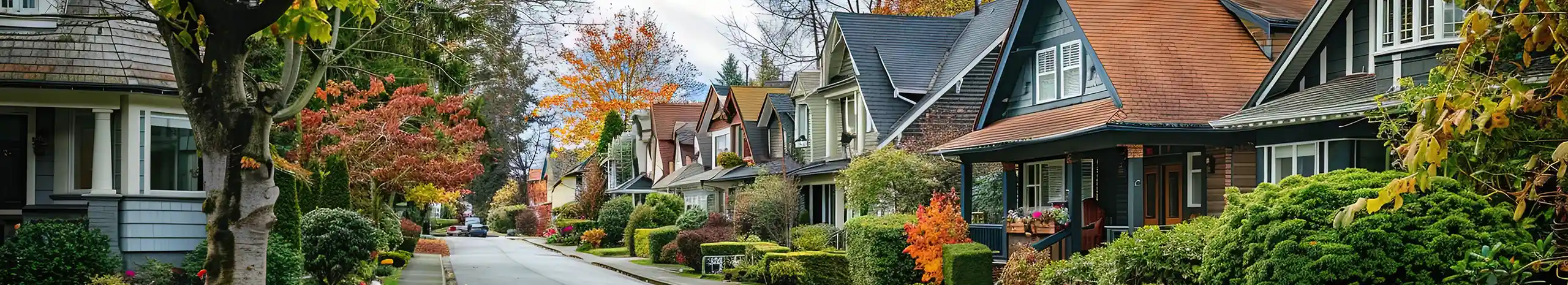 Pleasant neighborhood with vintage houses and shrubs in Vancouver, WA